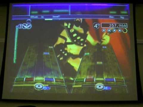 how to sync rockband guitar to wii