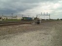 The yard job pulls out of Eola at a steady pace, stops, then shoves back in. That sounded sexual... BNSF 1224 and EMDX 779 are doing it.