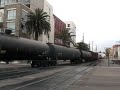 San Diego Coaster train 665 with F40PHM-2C 2105 with a stellar K5LA, cabcar 2310, races the BNSF DAYGO Manifest out of San Diego's Downtown Santa Fe Depot. BNSF 7715 (great K5HL), BNSF GEVO 7725, and 7709 lead the manifest. Note how similar 2105's K5LA sounds to an Amtrak F40's. Enjoy! Honors: #41 - Most Discussed (Today) - Autos & Vehicles #33 - Top Favorited (Today) - Autos & Vehicles #22 - Top Rated (Today) - Autos & Vehicles