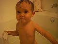 Bethany taking a bath at 9 months