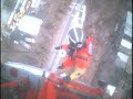 Coast Guard rescues utility workers trapped on 140-foot pole