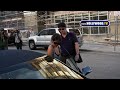 katie holmes was all set to make a clean getaway in hollywood today, but someone managed to walk right up to her car as it was just about to drive off. her peerless security instantly appeared and blocked katie, and bade the man to make his merry way...someplace else.