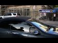 katie holmes was all set to make a clean getaway in hollywood today, but someone managed to walk right up to her car as it was just about to drive off. her peerless security instantly appeared and blocked katie, and bade the man to make his merry way...someplace else.