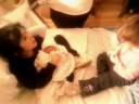 Santina feeds new born Natalia