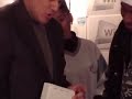Reggie signs a Wii Reggie signs a Wii