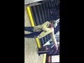 Drunk guy on Subway platform fights with no one and songs of heartbreak.