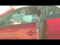 johnnypuna presents \"a fat lady makes her car say \"OUCH!\"
