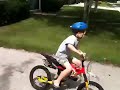 Joey jumping his bike.