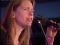 ygdrassil (linde nijland & annemarieke coenders) and bert ridderbos at the folkwoods festival 2006 singing linde's song 'here, right here and i'm looking at the sun' of the 2002 ygdrassil album 'nice days under darkest skies'.