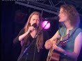 ygdrassil (linde nijland & annemarieke coenders) and bert ridderbos at the folkwoods festival 2006 singing linde's song 'here, right here and i'm looking at the sun' of the 2002 ygdrassil album 'nice days under darkest skies'.