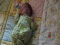Allie on Ommie's quilt