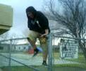 obese kid trying to hop a fence for Mcdonalds..