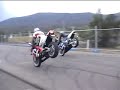 Ham and Darnson doing a stoppie.