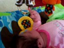 Kadence playing with her play mat Kadence playing with her play mat
