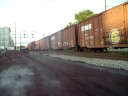 2 train meet! SB NS mixed freight & NB Ns rack with UP unit