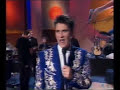 this was recorded for uk's channel four in 1990. kd and the reclines were promoting their new album absolute torch & twang. 

johnny get angry was written by hal david and sherman edwards.  the only version available from kd, which is live, is on a 12 inch record with 'our day will come'.

here's the full set list from the show:-

big boned gal
western stars
johnny get angry
honky tonk heart (?)
i'm down to my last cigarette
three cigarettes in an ashtray
hanky panky
got the bull by the horns
big big love
trail of broken hearts
crying
turn me round
i'll be back
-
walking after midnight



no copyright infringement intended! if copyright owner wishes the video to be removed please contact me directly. thanks