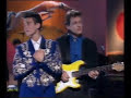 this was recorded for uk's channel four in 1990. kd and the reclines were promoting their new album absolute torch & twang. 

johnny get angry was written by hal david and sherman edwards.  the only version available from kd, which is live, is on a 12 inch record with 'our day will come'.

here's the full set list from the show:-

big boned gal
western stars
johnny get angry
honky tonk heart (?)
i'm down to my last cigarette
three cigarettes in an ashtray
hanky panky
got the bull by the horns
big big love
trail of broken hearts
crying
turn me round
i'll be back
-
walking after midnight



no copyright infringement intended! if copyright owner wishes the video to be removed please contact me directly. thanks