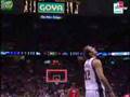 Chris Bosh of the Toronto Raptors hits a three quarter court shot