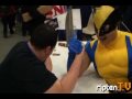 Man Arm Wrestles Wolverine