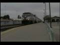 Nocal squealing Amcal #2012 highballs Merced on Amtrak #713