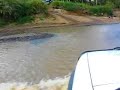 Driving Through River in Papua New Guinea