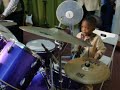 3years old boy playing drum in FOF church las palmas spain 3
