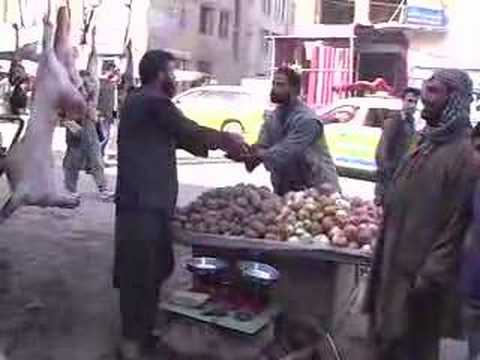 Kabul - Top down look and into Kabul streets and daily life. Producer Stephen Etheredge visits local shopping mall.