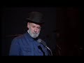 lawrence ferlinghetti reciting the poem 'loud prayer' at the band's final concert, called 'the last waltz'.