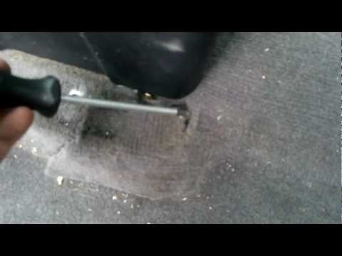 How to cut the floor mat to install an OEM armrest into a Saab 9000.