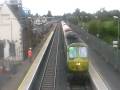 A 201 with mark 3 carrages passes Hazelhatch and look at the idiot running after it!