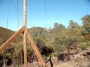 Serey and Brent coming down the Moaning Caverns zip line.