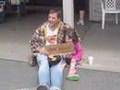 Funny video of Guy begging for Free iphone 2.0 on street