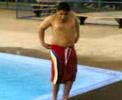 State Rd employees pay small aftrican american boy with money from the register to do belly flops. Boy later pukes in pool.