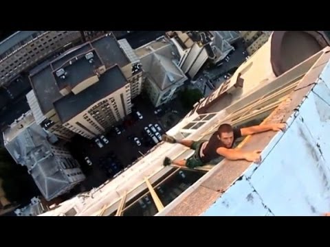 daredevil - Try not to get dizzy watching this dangling daredevil. Jeanne Moos reports on stunts that may make your palms sweat. More from CNN at http://www.cnn.com/ To ...