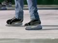 in spite of the warm climate, new technological advancements now enable outdoor ice rinks to be built in southern california.  sandra hughes straps on her skates for a test run.