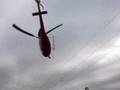 electricity company with helicopter.