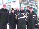 Sno Mads from Oakland County ride into Frederic