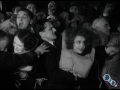 A thinly-veiled retelling of the Titanic disaster - direct reference to which was forbidden by the White Star Line - EA Dupont's 1929 epic 'Atlantic' was among the earliest British sound films and the first produced in multiple languages (English, German, and later French). This extract from the English version features Madeleine Carroll in her first sound role. You can see the complete film and over 2000 other titles free in BFI Mediatheques around the UK - www.bfi.org.uk