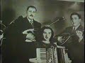 music of the outsiders:  rembetika.  a documentary made in around 1988.  the program has english subtitles.

george dalaras narrates in english.
in this episode dalaras introduces the mangas and he speaks with sophia karivalis and stelios vamvakaris.

sophia karivalis and george dalaras sing 