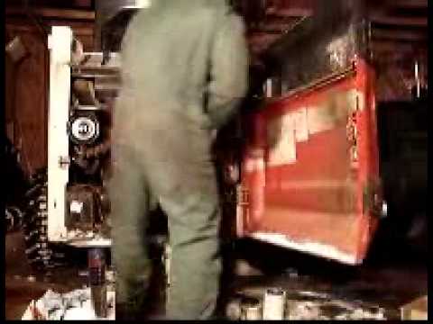 how to drain hydraulic oil on bobcat