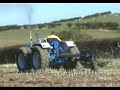 County 1124 Tractor using a 6 Furrow Plough County 1124 Tractor using a 6 Furrow Plough