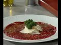 Carpaccio de buey con virutas de queso parmesano