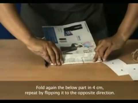 paper bag - A simple steps to convert newspaper waste into recycled bag, reducing the amount of plastic bag waste that contaminates the environment.