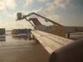 Deicing Northwest Airline SAAB-340 at DTW [1]