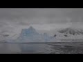Blog: www.full-time-fun.blogspot.com Tourists on a cruise in Antarctica capture footage of a massive iceberg collapsing into the ocean.