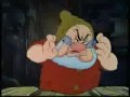 i made this video with pics from disney's picture snow-white and the seven dwarves
lyrics:
ten dwarfs walking whistling, singing
joking, bouncing making noise ten? ... ten
had some drinks after work
now they're heading towards home

but they're in for a big surprise, they're about to meet
snow-white

chorus:
red lips
white skin
black hair
snow-white has
flirt bit,
bint, wench
fairy-whore
snow: white
blood: red
heart: black
snow-white has
minx, slut
slag, tart
fairy-whore

one dwarf had a heart-attack
he couldn't face the mess
another having no more weed
spiralled in deep depressions
three and four killed each other
in a jealous fury
number five, with other tendencies
escaped to find his prince

meanwhile, comatose, happy in a dwarf's warm bed:
snow-white!
*chorus*

after years of subserviance
they were close to death
a pathetic prince appeared
with gleeful number five in tow
snow-white, bored of midgets and obvious shortfalls
seduced the man; of course
eloping with the somewhat less pathetic prince
she left the dwarfs, helpless, in a mess

red: red
white: white
black: black
ebony
snow: snow
blood: blood
fairy whore

seven dwarfs walking whistling, singing
joking, bouncing, making noise
they all recovered very quickly
once surrounded by their friends
they hired a retired sorceres
as protection for their home
just in case another day
snow-white comes along

meanwhile, comatose, happy in his bed:
the prince!

*chorus*