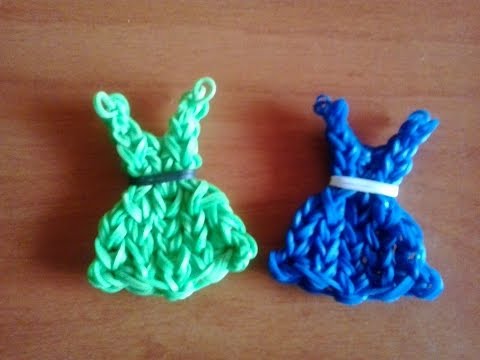 como hacer un vestido - Hola a tod@s , en este video os enseño a hacer un vestido con nuestras gomitas , el ganchillo y el telar. SUSCRIBETE A MI CANAL PARA MAS VIDEOS Y DALE UN LIK...