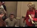 Ann Shofner meets her musher, Hugh Neff