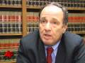Fmr. Nasdaq Chairman Accused of Duping Investors