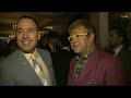 elton john and david furnish talk father's day gifts, bedtime stories and new music at the richard james show during men's fashion week. report by poppy jami...